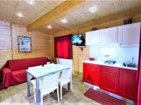 Wooden chalet in La Salle with shared pool La Salle